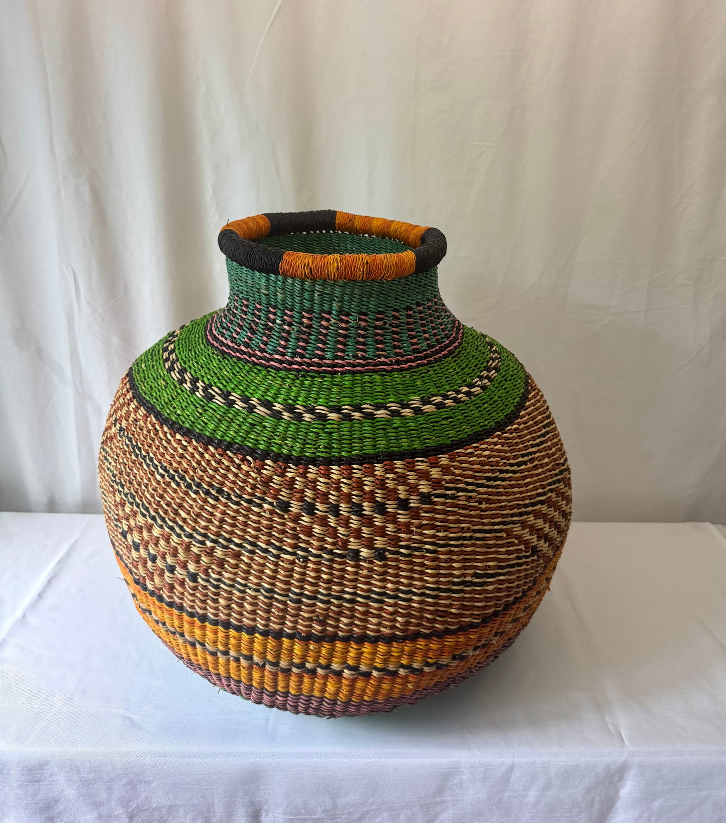 Jemima 10 Cows Décor Basket – Green & Orange

The Baba Tree Collection
A Curated Artisan Reserve by Akua’s Corner